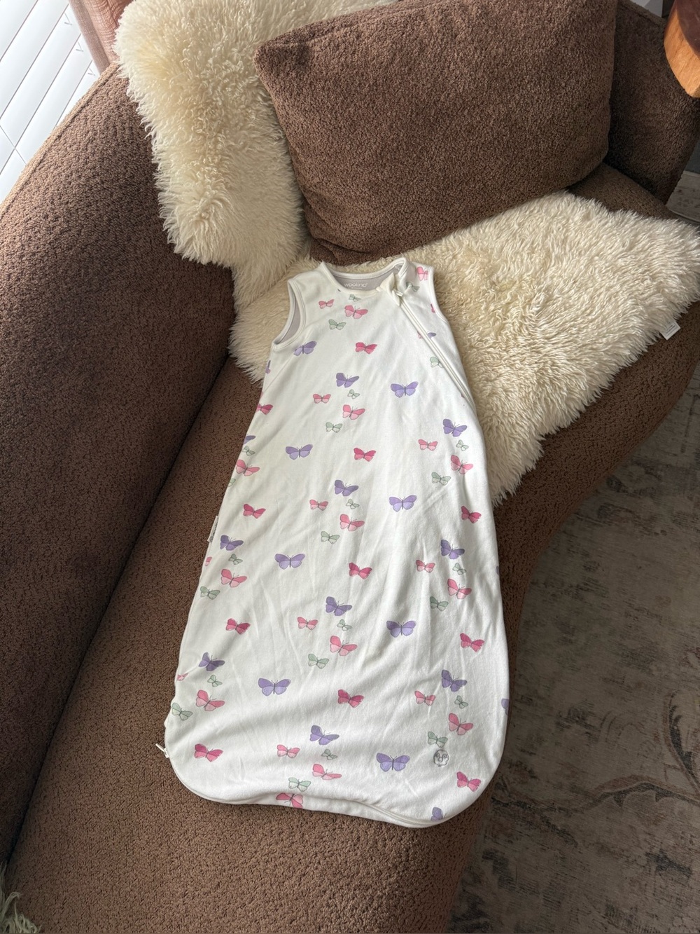Woolino 4 Season Classic Baby Sleep Bag in butterfly pattern.